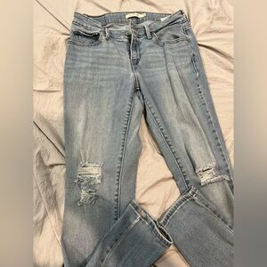 Levi's Light Blue Distressed Straight Leg Jeans